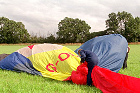 Air is expelled by hand ready for the envelope to be repacked